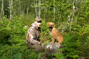 AJ and Tank in the woods
