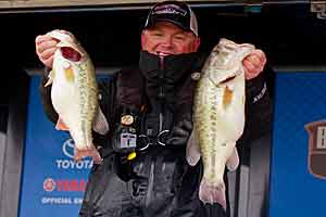 North Carolina bass tournament angler Shane Lineberger catches big bass on buzzbaits. He fishes them through the summer and into late fall. He waits till the water temperature drops to the low 60s before putting them up for the winter.