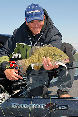 Flukes can be fished a variety of ways to fool husky smallmouth bass like the one Joe Balog is cradling.