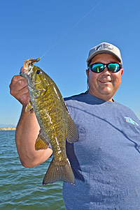 Sam Heckman used a Zoom Ultravibe Speed Craw to corral this respectable Pueblo Reservoir smallie.