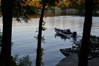 Preparations for fall-fishing success can start while the weather is still hot and humid. Spend time looking for spots, such as shallow flats in reservoirs and inside edges of aquatic vegetation on natural lakes, that bass will use once the water temperature drops. Photo by Pete M. Anderson