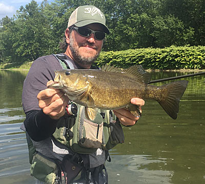 Spring and summer are great times for catching numbers of Allegheny River smallmouth. Local guide Pete Cartwright said you also will have a shot at one about 20 inches every day. Photo courtesy of Pete Cartwright