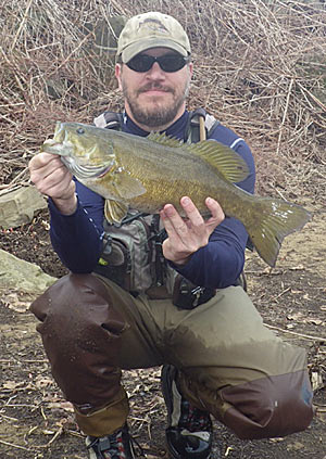 Allegheny River smallmouth congregate in deep stretches during winter, when local guide Pete Cartwright catches his biggest smallmouth of the year. Photo courtesy of Pete Cartwright