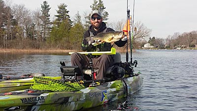 Electronics are a large part of Mike McKinstry’s kayak fishing. He uses a Humminbird Helix 7, mounted in front of his seat, to keep an eye on what the bass are doing and several cameras to capture fishing action for his Bassquatch Hunter TV YouTube channel. Photo courtesy of Mike McKinstry