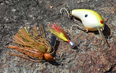 Tackle collecting is an enjoyable, exciting, and many times addictive reason that bass fishing is great. It might be searching out the latest pieces of history. It also could be hunting down unique lures specific to certain fisheries and regions, including, from top to bottom, a Brian’s Bee crankbait from North Carolina, a Rock-a-roo jig from Iowa’s Great Lakes and a Shooter Jig from North Carolina. Photo by Pete M. Anderson