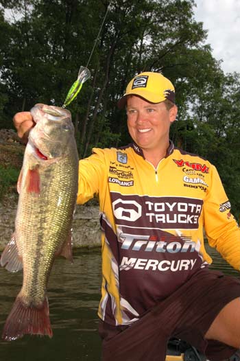 Touring pro Terry Scroggins runs medium-diving crankbaits to catch bass replenishing on ledges in rivers.  