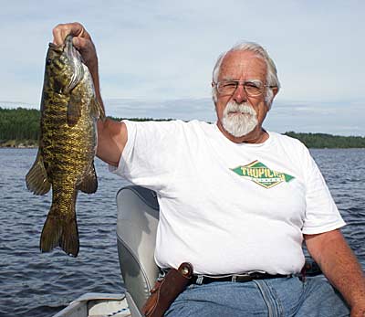 My father with a beautiful smallmouth.