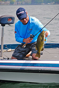 2)	Scott Dobson used a deep-diving crankbait to fool this August smallie.