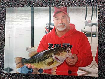 Greg West caught this 8.24-pound largemouth on his trusty Chompers Skirted Grub to earn big bass honors in a winter tournament. 