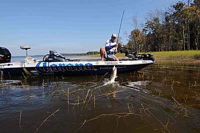 Brandon Coulter relies on a plastic toad to cover a lot of water along vast flats with sparse grass.