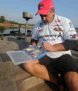 Pete Ponds fishes out of a “to go” box to avoid spending too much time searching for lures in his boat.