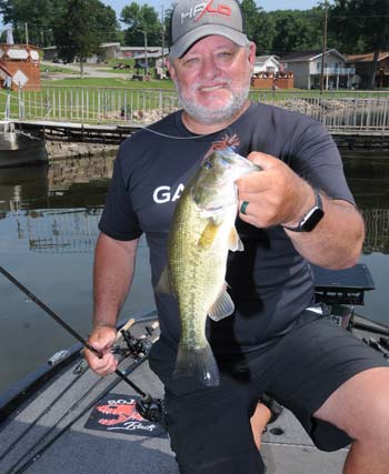 A jig is one of Jeff Hoots’ favorite lures for catching transitioning bass shortly after the spawn. (Photo by John Neporadny Jr.)