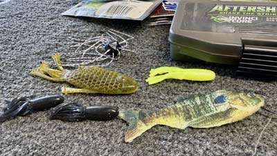 The baits that excel around the spawn run the gamut, but soft plastics that imitate bluegill, dice-style baits, and small tubes are great options.