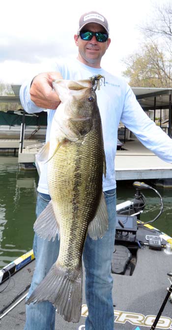A jig and plastic craw catches spawning bass from clear to muddy water during cold front conditions. 