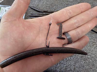 Accessories like the Super Baitlock allow you to rig a worm without damaging it, allowing you to catch more fish with one single bait. Simply insert the plastic, cut it down on the other side, and insert your hook through the holes.
