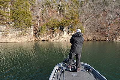 Deep holes in rivers are favorite spots for Jack Uxa to catch wintertime smallmouth bass.
