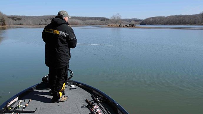 Terry Blankenship concentrates on deeper holes of reservoir tributaries to catch bass in the early spring.