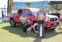 KVD just stood there while Toyota representatives worked to put a shine on the Tacoma’s tires.