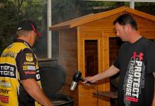 Team Toyota anglers Terry Scroggins and KVD put a little air to the Big Green Egg’s coals in an effort to grill a steak Saturday night.